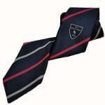 University college school navy tie with a crest